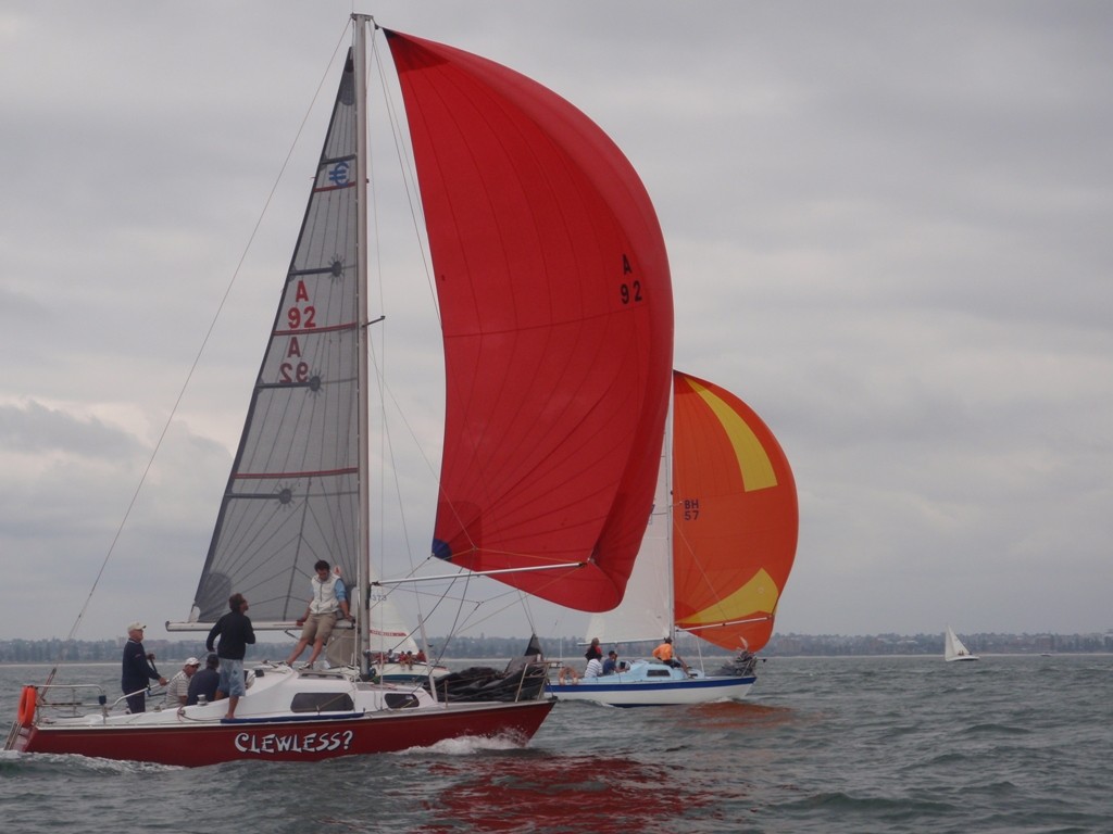 Guy Irwin’s Clewless (left) and Brian Christenson’s Wundurra neck and neck downwind - Endeavour Australian National and NSW State Championships   © Wai Lee